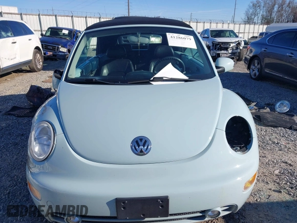 2003 Volkswagen Beetle GLS z VIN 3VWCK21YX3M304572, wystawiony jako IAAI lot #41286079 z przebiegiem 42 450 mil mil oraz . Historia ofert i sprzedaży dostępna na DreamBid. Obrazek 12.