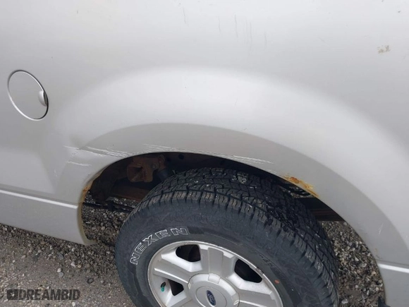 2004 Ford F-150 XL with VIN 1FTPX12544NC61388, listed as a IAAI auction lot 41845397 with 302,883 mi miles. Bid and sale history available at carsss.com. Image 15.