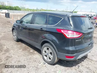 2013 Ford Escape SE with VIN 1FMCU0GX1DUA99040, listed as a IAAI auction lot 42084787 with 140,473 mi miles and . Bid and sale history available at DreamBid. Image 3.
