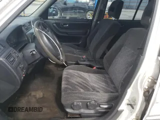 1999 Honda CR-V EX with VIN JHLRD1868XC017277, listed as a Copart auction lot 50507545 with 323,379 mi miles and Salvage Title. Bid and sale history available at carsss.com. Image 7.