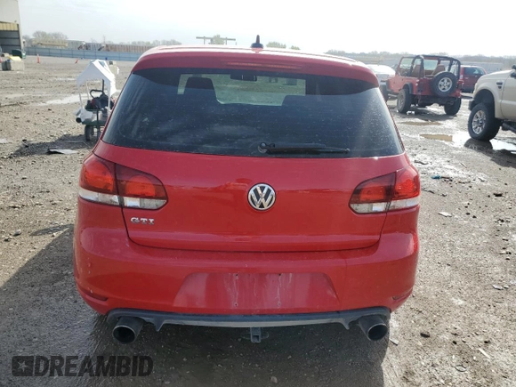2011 Volkswagen GTI z VIN WVWGV7AJ3BW032490, wystawiony jako Copart lot #50972365 z przebiegiem 123 988 mil mil oraz Szkoda całkowita • Salvage title. Historia ofert i sprzedaży dostępna na DreamBid. Obrazek 6.