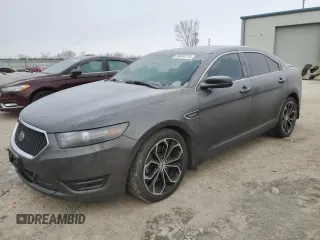 2015 Ford Taurus SHO with VIN 1FAHP2KT8FG158965, listed as a Copart auction lot 89404715 with 122,032 mi miles and Salvage Title. Bid and sale history available at DreamBid. Image 1.