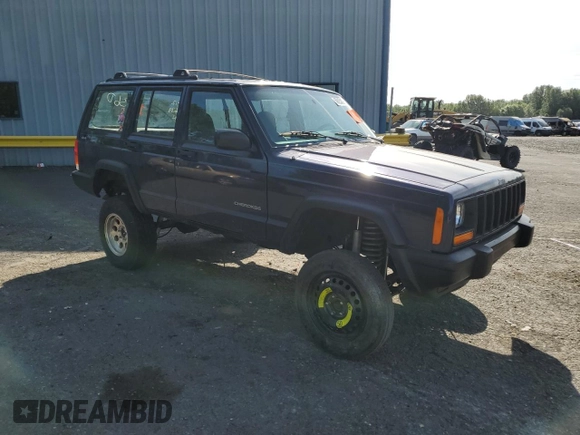 1999 Jeep Cherokee SE with VIN 1J4FF28S0XL541871, listed as a Copart auction lot 59250264 with Not provided miles and Salvage title. Bid and sale history available at DreamBid. Image 4.