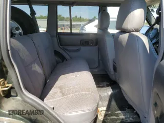 1998 Jeep Cherokee Sport with VIN 1J4FJ68S3WL150458, listed as a Copart auction lot 63278935 with 176,314 mi miles and Clean title. Bid and sale history available at DreamBid. Image 11.