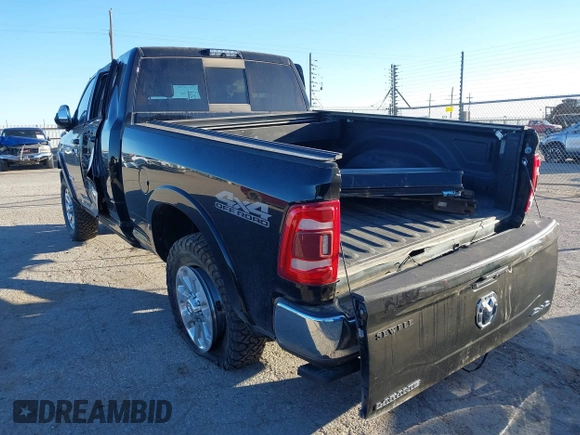 2021 Ram 2500 Laramie with VIN 3C6UR5NL5MG515382, listed as a IAAI auction lot 41735822 with 65,613 mi miles. Bid and sale history available at carsss.com. Image 3.