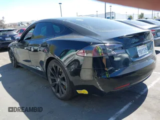 2018 Tesla Model S 75D with VIN 5YJSA1E20JF282889, listed as a IAAI auction lot 41823505 with 110,049 mi miles and . Bid and sale history available at DreamBid. Image 3.