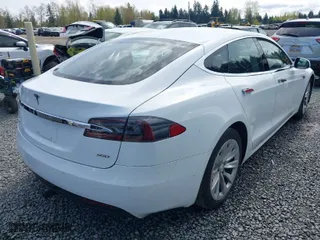 2016 Tesla Model S 90D with VIN 5YJSA1E28GF143859, listed as a IAAI auction lot 41969776 with 62,321 mi miles. Bid and sale history available at carsss.com. Image 4.