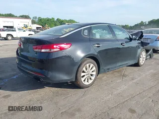 2016 Kia Optima EX with VIN 5XXGU4L3XGG033323, listed as a IAAI auction lot 42088998 with 134,686 mi miles and . Bid and sale history available at carsss.com. Image 4.