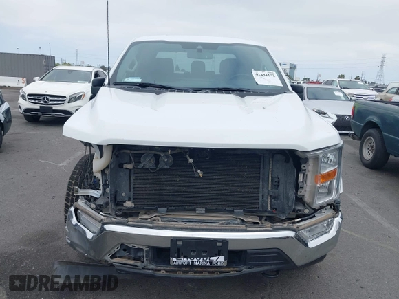 2021 Ford F-150 XL z VIN 1FTFW1E16MFC73480, wystawiony jako IAAI lot #42431172 z przebiegiem 67 041 mil mil oraz . Historia ofert i sprzedaży dostępna na DreamBid. Obrazek 13.