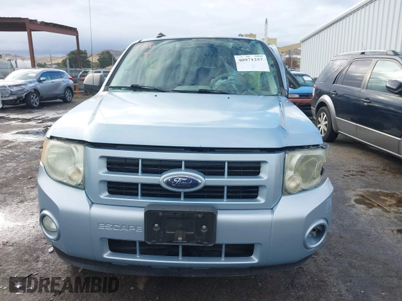 2009 Ford Escape Hybrid with VIN 1FMCU49309KB71172, listed as a IAAI auction lot 40971257 with 118,689 mi miles. Bid and sale history available at carsss.com. Image 13.