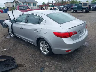 2013 Acura ILX Hybrid Technology z VIN 19VDE3F78DE302392, wystawiony jako IAAI lot #42207701 z przebiegiem 174 587 mil mil oraz . Historia ofert i sprzedaży dostępna na DreamBid. Obrazek 3.