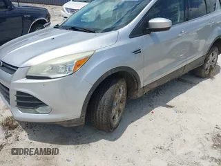 2014 Ford Escape SE with VIN 1FMCU9G9XEUD91390, listed as a IAAI auction lot 42561849 with 319,400 mi miles and . Bid and sale history available at DreamBid. Image 18.