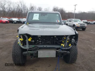 2023 Ford Bronco z VIN 1FMEE5DP4PLB54095, wystawiony jako IAAI lot #41445801 z przebiegiem 12 170 mil mil oraz . Historia ofert i sprzedaży dostępna na DreamBid. Obrazek 13.