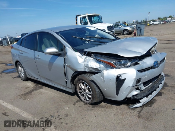 2021 Toyota Prius L Eco with VIN JTDKAMFUXM3144991, listed as a IAAI auction lot 42147025 with 106,466 mi miles and . Bid and sale history available at DreamBid. Image 1.