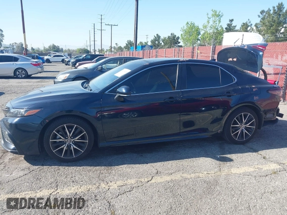 2021 Toyota Camry SE Nightshade with VIN 4T1T11AKXMU430841, listed as a IAAI auction lot 42019485 with 124,561 mi miles. Bid and sale history available at carsss.com. Image 15.