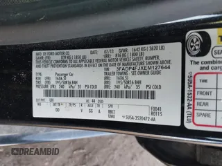 2014 Ford Fiesta Titanium z VIN 3FADP4FJXEM127644, wystawiony jako IAAI lot #41555040 z przebiegiem 107 046 mil mil oraz . Historia ofert i sprzedaży dostępna na DreamBid. Obrazek 9.
