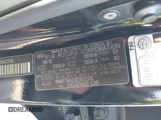 2013 Kia Forte LX with VIN KNAFT4A2XD5672131, listed as a IAAI auction lot 41820035 with 154,998 mi miles. Bid and sale history available at carsss.com. Image 9.