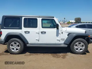 2018 Jeep Wrangler Unlimited Sport with VIN 1C4HJXDG4JW319142, listed as a IAAI auction lot 42702550 with 72,023 mi miles and . Bid and sale history available at DreamBid. Image 13.