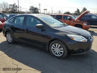 2013 Ford Focus S with VIN 1FADP3E28DL143460, listed as a Copart auction lot 48893115 with 112,552 mi miles and Salvage Title. Bid and sale history available at carsss.com. Image 4.