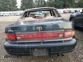 1994 Toyota Camry XLE with VIN JT2GK13E2R0008225, listed as a Copart auction lot 83668084 with 258,735 mi miles and Salvage Title. Bid and sale history available at carsss.com. Image 6.