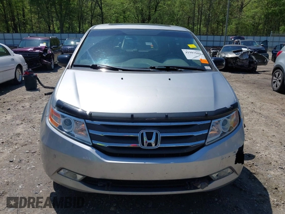2012 Honda Odyssey Touring with VIN 5FNRL5H96CB043939, listed as a IAAI auction lot 41983643 with 202,535 mi miles. Bid and sale history available at carsss.com. Image 13.