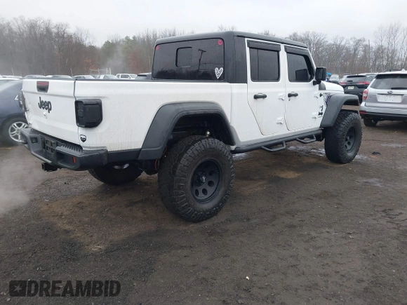 2020 Jeep Gladiator Sport S z VIN 1C6HJTAG0LL129461, wystawiony jako IAAI lot #41464713 z przebiegiem 66 625 mil mil oraz . Historia ofert i sprzedaży dostępna na DreamBid. Obrazek 4.