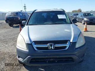 2002 Honda CR-V LX with VIN JHLRD68432C019992, listed as a IAAI auction lot 41963062 with 154,917 mi miles and . Bid and sale history available at carsss.com. Image 6.
