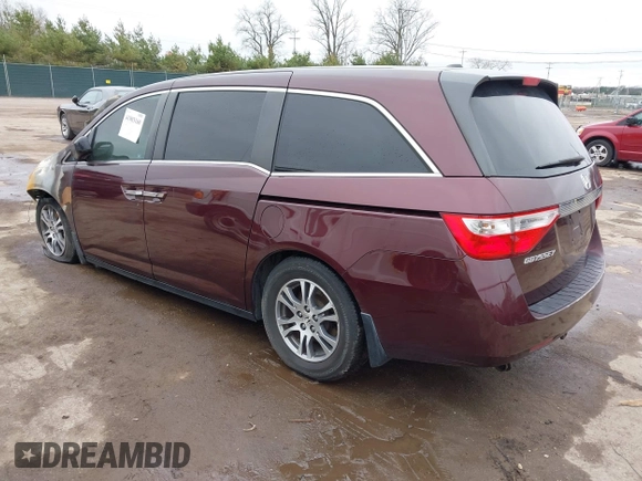 2011 Honda Odyssey EX-L with VIN 5FNRL5H64BB059576, listed as a IAAI auction lot 41903160 with 150,000 mi miles and . Bid and sale history available at carsss.com. Image 3.