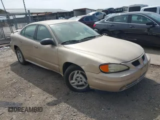 2003 Pontiac Grand Am SE with VIN 1G2NE52F73C171244, listed as a IAAI auction lot 41572797 with 5 mi miles. Bid and sale history available at carsss.com. Image 1.