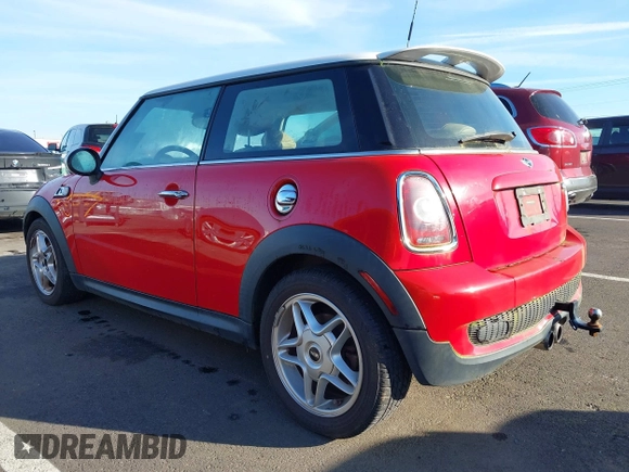 2010 MINI Hardtop S with VIN WMWMF7C50ATZ69911, listed as a IAAI auction lot 41393076 with 94,891 mi miles and . Bid and sale history available at DreamBid. Image 3.