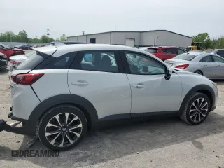 2019 Mazda CX-3 Touring z VIN JM1DKFC76K1451342, wystawiony jako Copart lot #58413935 z przebiegiem 21 391 mil mil oraz Szkoda całkowita • Salvage title. Historia ofert i sprzedaży dostępna na DreamBid. Obrazek 3.