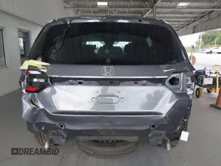2025 Honda Pilot EX-L z VIN 5FNYG2H40SB019525, wystawiony jako IAAI lot #42190029 z przebiegiem 10 794 mil mil oraz . Historia ofert i sprzedaży dostępna na DreamBid. Obrazek 17.
