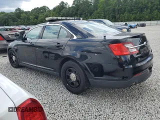 2014 Ford Police Interceptor with VIN 1FAHP2L82EG105333, listed as a Copart auction lot 66361525 with 101,176 mi miles and Clean title. Bid and sale history available at DreamBid. Image 2.