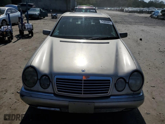 1997 Mercedes-Benz E-Class with VIN WDBJF55F8VJ031008, listed as a Copart auction lot 74305684 with 308,905 mi miles and Clean Title. Bid and sale history available at carsss.com. Image 5.