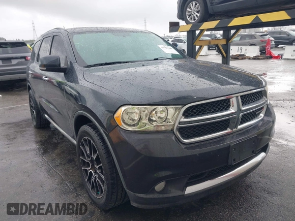 2013 Dodge Durango Crew with VIN 1C4RDJDG3DC675676, listed as a IAAI auction lot 41765289 with 140,626 mi miles. Bid and sale history available at carsss.com. Image 1.