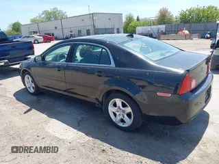 2012 Chevrolet Malibu 1LS with VIN 1G1ZB5E0XCF223485, listed as a IAAI auction lot 42238816 with 103,279 mi miles and . Bid and sale history available at DreamBid. Image 3.