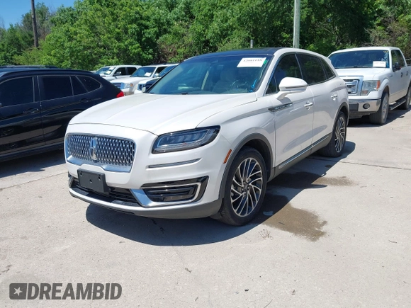 2019 Lincoln Nautilus Reserve z VIN 2LMPJ6L96KBL12639, wystawiony jako IAAI lot #42081118 z przebiegiem 23 741 mil mil oraz . Historia ofert i sprzedaży dostępna na DreamBid. Obrazek 21.