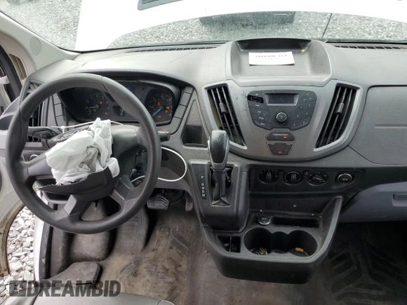 2016 Ford Transit Cargo with VIN 1FTYR1ZM1GKA62977, listed as a Copart auction lot 57054015 with 62,670 mi miles and Salvage title. Bid and sale history available at DreamBid. Image 8.