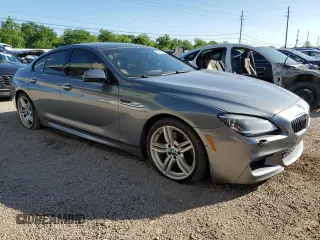 2014 BMW 6 Series 650i xDrive z VIN WBA6B4C53ED371461, wystawiony jako Copart lot #51136055 z przebiegiem 143 213 mil mil oraz Tytuł czysty. Historia ofert i sprzedaży dostępna na DreamBid. Obrazek 4.