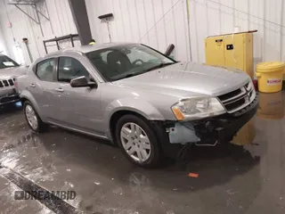 2014 Dodge Avenger SE z VIN 1C3CDZAB4EN228880, wystawiony jako IAAI lot #41605761 z przebiegiem 97 437 mil mil oraz . Historia ofert i sprzedaży dostępna na DreamBid. Obrazek 1.
