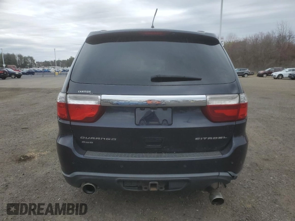 2011 Dodge Durango Citadel with VIN 1D4SE5GTXBC595273, listed as a Copart auction lot 54205335 with 164,073 mi miles and Clean title. Bid and sale history available at DreamBid. Image 6.