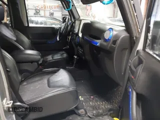 2013 Jeep Wrangler Unlimited Sport z VIN 1C4BJWDG3DL628784, wystawiony jako IAAI lot #41311183 z przebiegiem 125 118 mil mil oraz . Historia ofert i sprzedaży dostępna na DreamBid. Obrazek 5.
