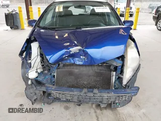2009 Honda Fit Sport with VIN JHMGE88459C001743, listed as a IAAI auction lot 41852048 with 128,225 mi miles. Bid and sale history available at carsss.com. Image 6.