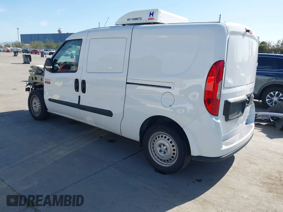 2022 Ram ProMaster City Cargo Tradesman with VIN ZFBHRFAB5N6Y45879, listed as a IAAI auction lot 41970512 with 12,584 mi miles and . Bid and sale history available at DreamBid. Image 3.