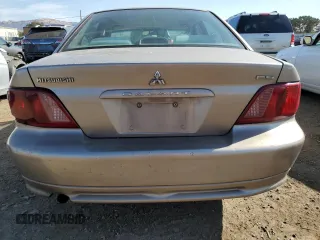 2002 Mitsubishi Galant ES z VIN 4A3AA46G12E123287, wystawiony jako Copart lot #74540784 z przebiegiem 259 181 mil mil oraz Szkoda całkowita • Salvage title. Historia ofert i sprzedaży dostępna na DreamBid. Obrazek 6.