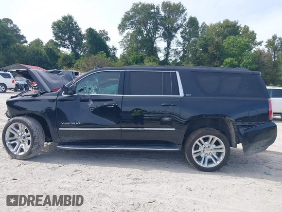 2019 GMC Yukon XL SLT with VIN 1GKS2GKCXKR359166, listed as a IAAI auction lot 40546837 with Not provided miles and . Bid and sale history available at DreamBid. Image 14.