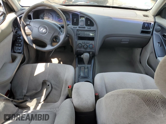 2004 Hyundai Elantra GLS z VIN KMHDN46D14U861749, wystawiony jako Copart lot #52625215 z przebiegiem 130 063 mil mil oraz Szkoda całkowita • Salvage title. Historia ofert i sprzedaży dostępna na DreamBid. Obrazek 8.