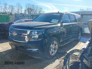 2015 Chevrolet Suburban LTZ with VIN 1GNSCKKC3FR249956, listed as a IAAI auction lot 41306605 with 122,942 mi miles and . Bid and sale history available at DreamBid. Image 17.