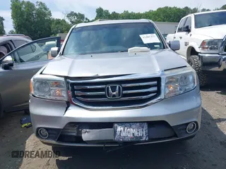 2012 Honda Pilot EX-L with VIN 5FNYF3H54CB019160, listed as a IAAI auction lot 42481437 with 142,911 mi miles and . Bid and sale history available at DreamBid. Image 12.