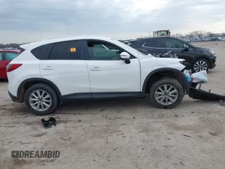 2016 Mazda CX-5 Touring with VIN JM3KE2CY1G0888850, listed as a IAAI auction lot 41562701 with 1 mi miles. Bid and sale history available at carsss.com. Image 13.